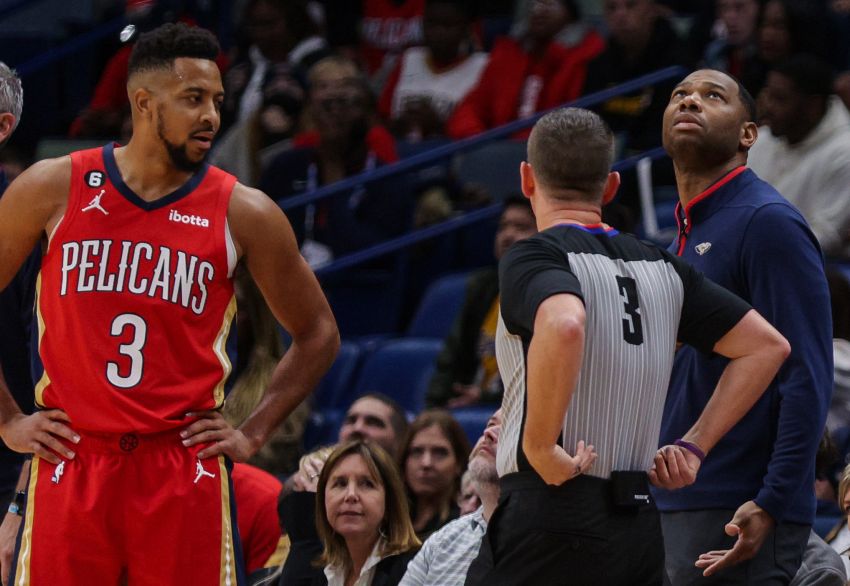 New Orleans Pelicans guard CJ McCollum (3) and New Orleans Pelicans head coach Willie Green